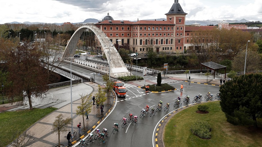 epa07494340 The pack of cyclists rides through Pamplona during the second stage of the Basque Country-Itzulia 2019 cycling race, over 149,5 kilometers between Zumarraga and Gorraiz, Navarra, northern  ...