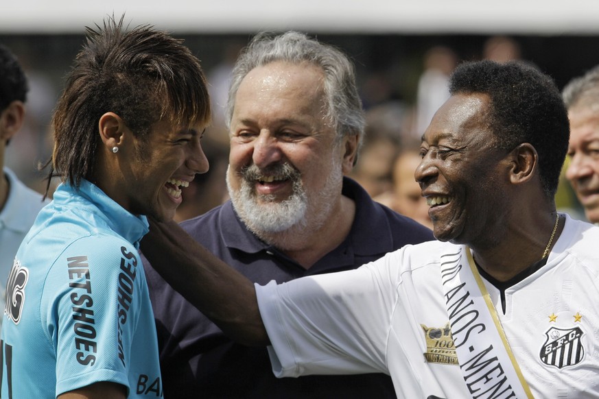FILE - In this April 14, 2012 file photo, soccer player Neymar, left, and former soccer player Pele, right, shares a laugh during the centennial anniversary celebration of the team in Santos, Brazil.  ...