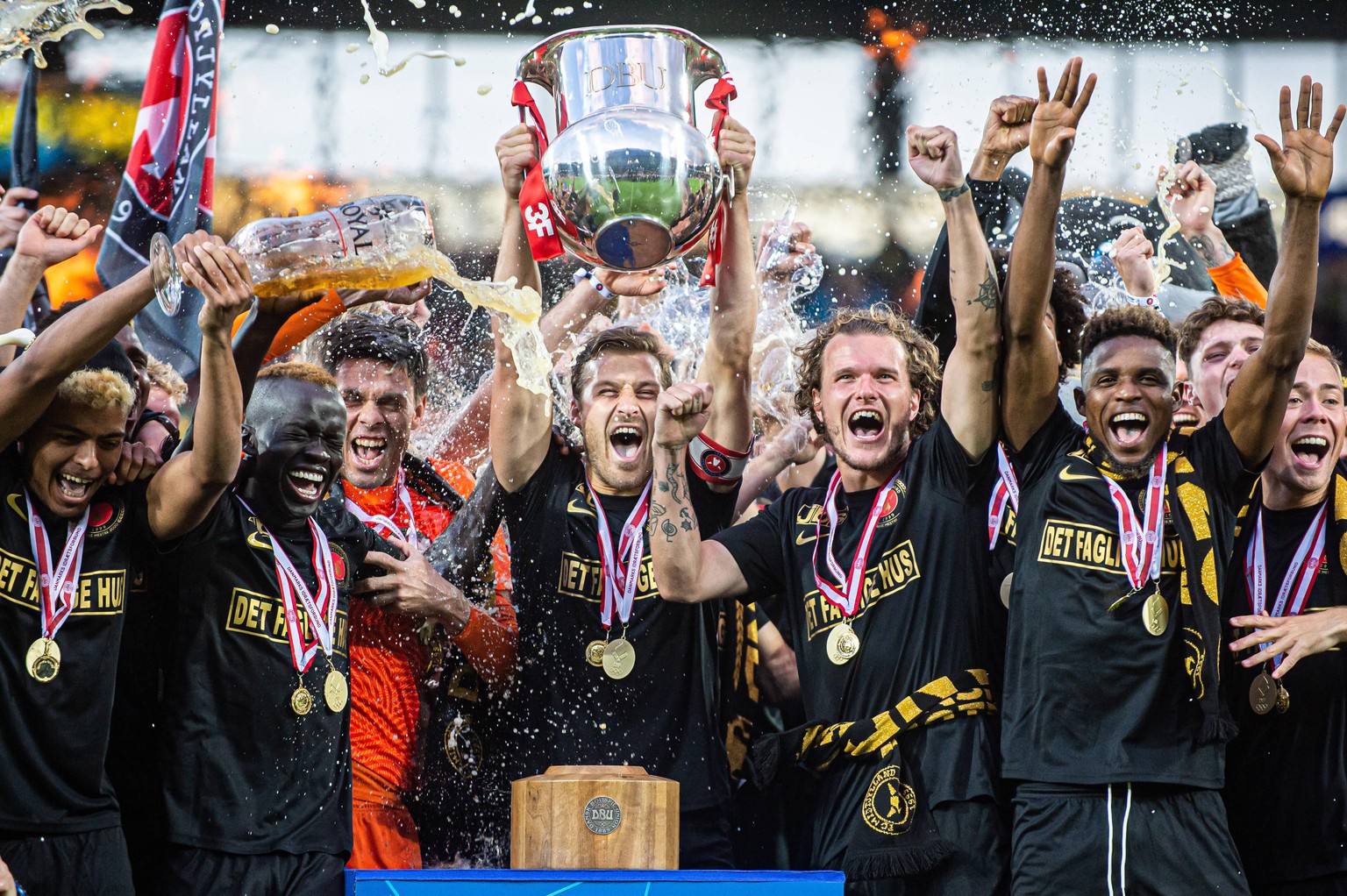 Herning, Denmark, 26th, July 2020. Captain Erik Sviatchenko of FC Midtjylland can raise the trophy as the 2019-2020 winners of the 3F Superliga after the match between FC Midtjylland and AAB at MCH Ar ...