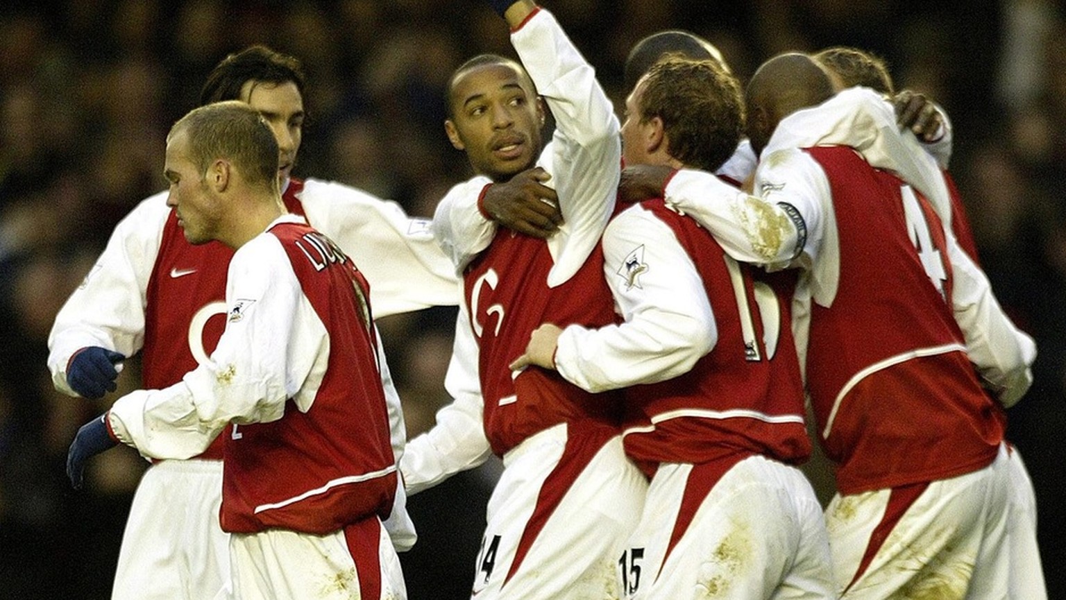 Arsenal&#039;s Thierry Henry (centre) celebrates his goal against Wolverhampton Wanderers with teammates during the FA Barclaycard Premiership match held at Arsenal&#039;s Highbury Park, north London, ...
