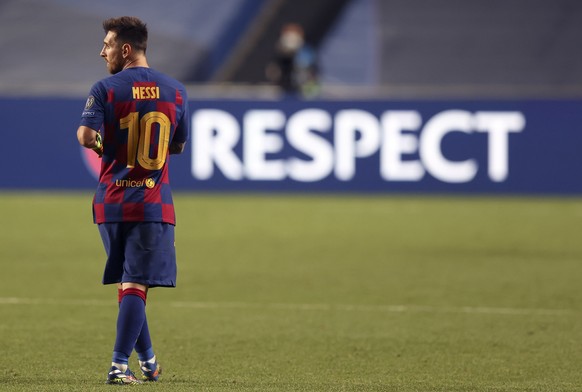 Barcelona&#039;s Lionel Messi leaves the pitch after the the Champions League quarterfinal soccer match between Barcelona and Bayern Munich in Lisbon, Portugal, Friday, Aug. 14, 2020. Bayern won the m ...