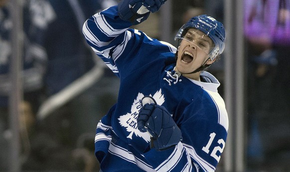 Toronto Maple Leafs&#039; Mason Raymond celebrates his goal against the Vancouver Canucks during the third period of an NHL hockey game, Saturday, Feb. 8, 2014 in Toronto. (AP Photo/The Canadian Press ...
