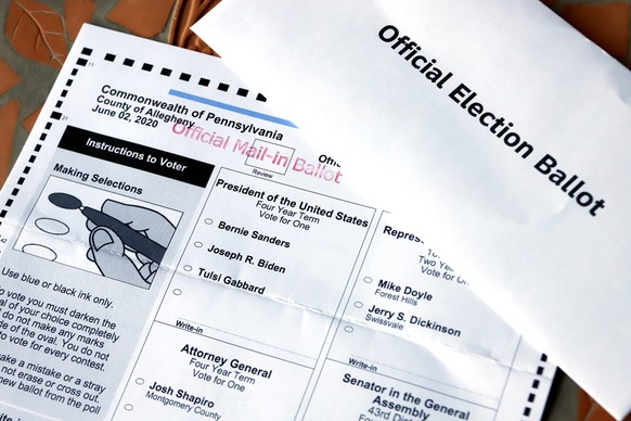 FILE - This May 26, 2020 file photo shows an Official Democratic General Primary mail-in ballot and secrecy envelope, for the Pennsylvania primary in Pittsburgh. Democrats are launching a digital ad t ...