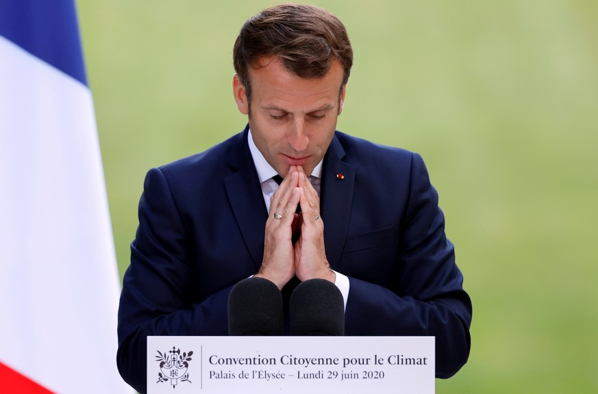 epa08515732 French President Emmanuel Macron delivers a speech during a meeting with members of the Citizens&#039; Convention on Climate (CCC) to discuss over environment proposals at the Elysee Palac ...