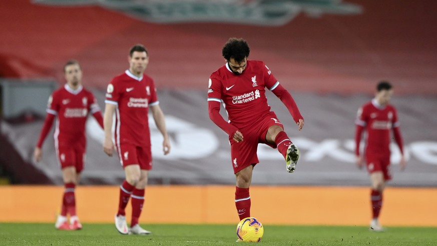 epa08994452 Liverpool&#039;s Mohamed Salah (C) and his teammates react during the English Premier League soccer match between Liverpool FC and Manchester City in Liverpool, Britain, 07 February 2021.  ...