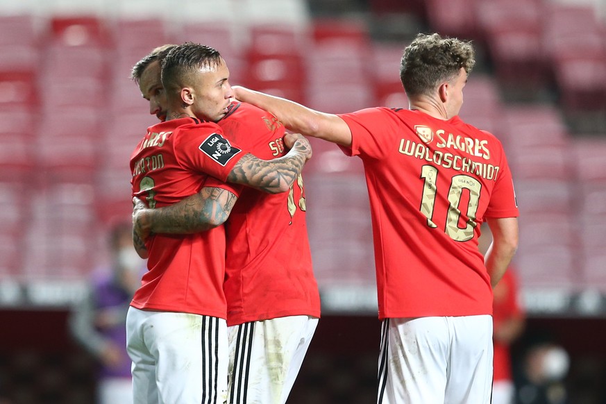 epa09045440 Benfica&#039;s player Haris Seferovic (C) celebrates his goal with team-mates Everton (L) and Luca Waldschmidt (R) during the Portuguese First League soccer match between SL Benfica and Ri ...