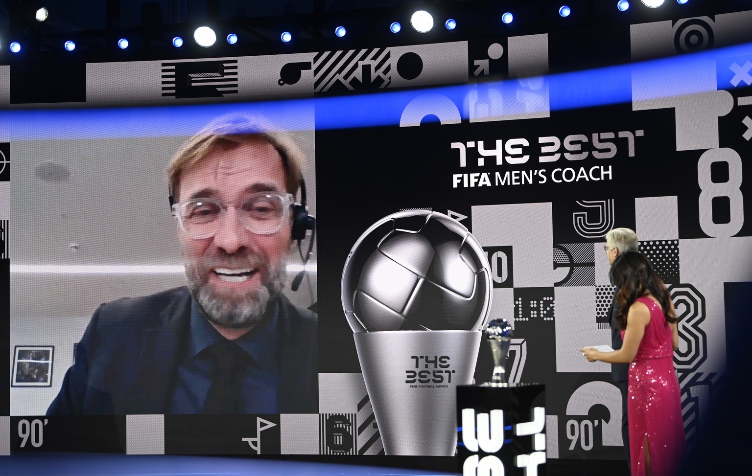 epa08890366 Liverpool manager Juergen Klopp appears on the screen after winning the Best FIFA Men&#039;s Coach Award during the Best FIFA Football Awards virtual TV show broadcast from the FIFA headqu ...