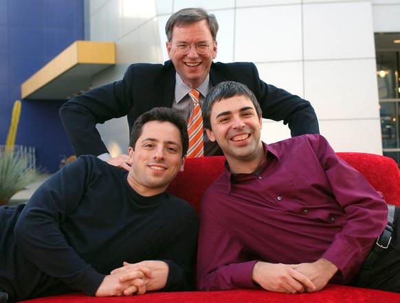 FILE - In this Jan. 15, 2004 file photo, Google CEO Eric Schmidt, top, and co-founders Sergey Brin, left, and Larry Page pose at the company&#039;s headquarters in Mountain View, Calif. Google’s IPO 1 ...