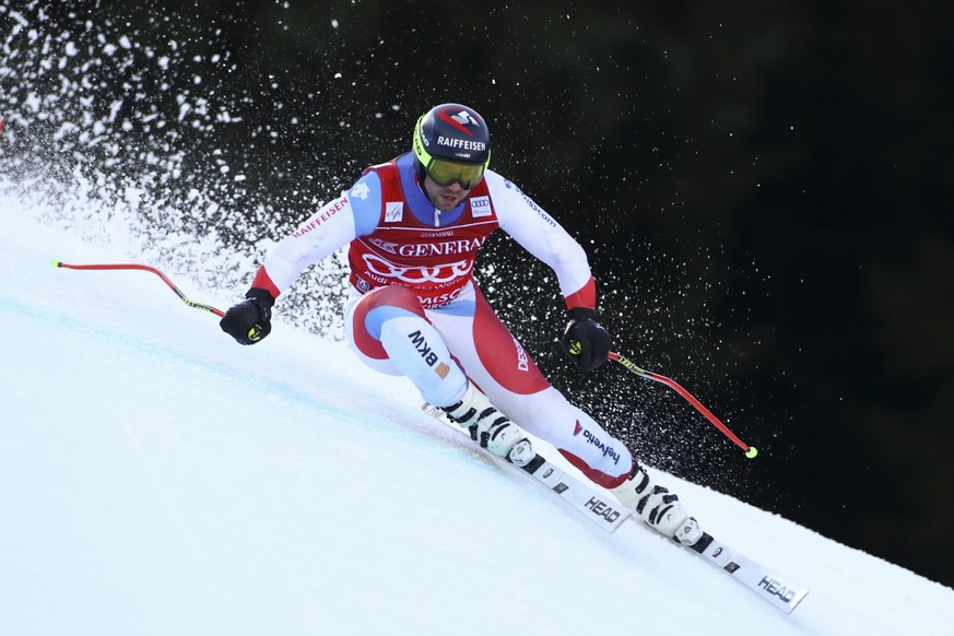 Switzerland&#039;s Beat Feuz competes in an alpine ski, World Cup, men&#039;s downhill training, in Garmisch Partenkirchen, Germany, Friday, Jan. 31, 2020. (AP Photo/Marco Trovati)