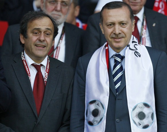 UEFA President Michel Platini, left, and Turkish President Recep Tayyip Erdogan chat prior to the quarterfinal match between Croatia and Turkey in Vienna, Austria, Friday, June 20, 2008, at the Euro 2 ...