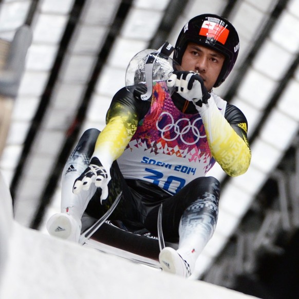 epa04064745 Bruno Banani of Tonga arrives to the finish in his third run in the men&#039;s singles Luge at the Sanki Sliding Center at the Sochi 2014 Olympic Games, Krasnaya Polyana, Russia, 09 Februa ...