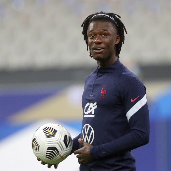 France&#039;s Eduardo Camavinga holds a ball during warmup before the UEFA Nations League soccer match between France and Portugal at the Stade de France in Saint-Denis, north of Paris, France, Sunday ...