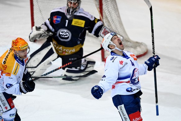Zsc&#039;player Patrick Geering right celebrates the 0 - 1 goal, during the preliminary round game of National League A (NLA) Swiss Championship 2018/19 between HC Ambri Piotta and ZSC Lions, at the i ...