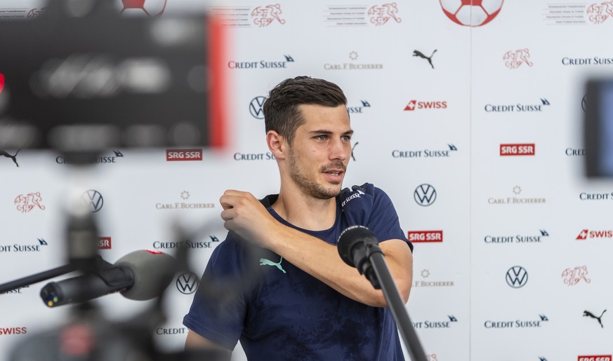 Switzerland&#039;s midfielder Remo Freuler, speaks to journalists after a training session closed to the press during the Euro 2020 soccer tournament at the Tre Fontane sports centre, in Rome, Italy,  ...