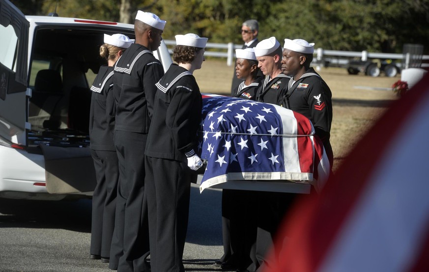 Sailors carry the casket of Cameron Walters at Oak Hill Cemetery in Richmond Hill, Ga., Monday, Dec. 16, 2019. Walters was one of the three Navy sailors killed in a Saudi gunman&#039;s attack at Pensa ...