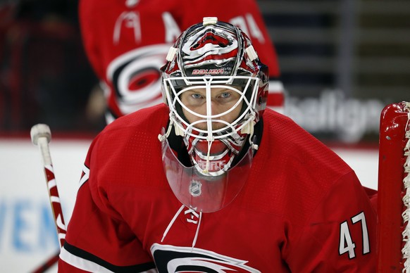 Carolina Hurricanes goaltender James Reimer watches puck during the third period of an NHL hockey game against the Detroit Red Wings in Raleigh, N.C., Thursday, April 29, 2021. (AP Photo/Karl B DeBlak ...