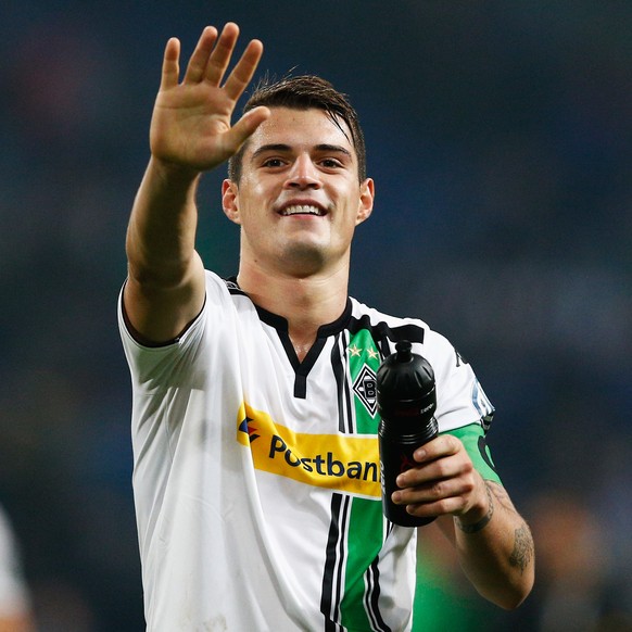 GELSENKIRCHEN, GERMANY - OCTOBER 28: Granit Xhaka of Borussia Monchengladbach celebrates victory after the DFB Cup match between FC Schalke 04 and Borussia Moenchengladbach held at Veltins-Arena on Oc ...