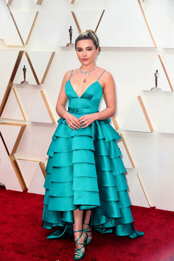 epa08207904 Florence Pugh arrives for the 92nd annual Academy Awards ceremony at the Dolby Theatre in Hollywood, California, USA, 09 February 2020. The Oscars are presented for outstanding individual  ...