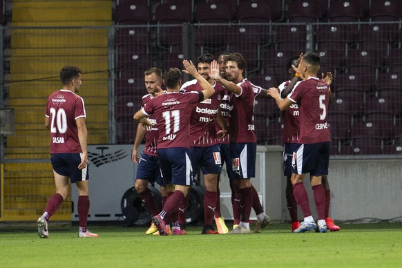 Servette&#039;s players celebrate their goal after scoring the 1:0, during the Super League soccer match of Swiss Championship between Servette FC and BSC Young Boys, at the Stade de Geneve stadium, i ...