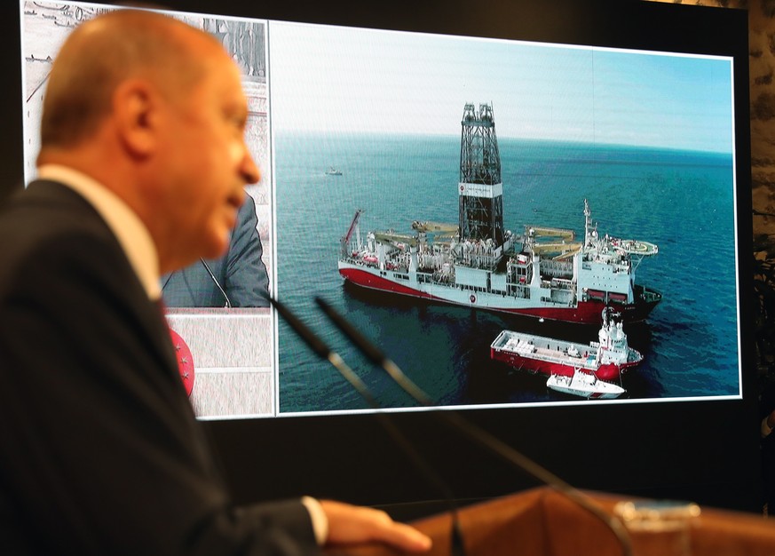 epa08616375 A handout photo made available by the Turkish President Press Office shows Turkish President Recep Tayyip Erdogan takes part of a video conference with Turkish drilling vessel Fatih during ...