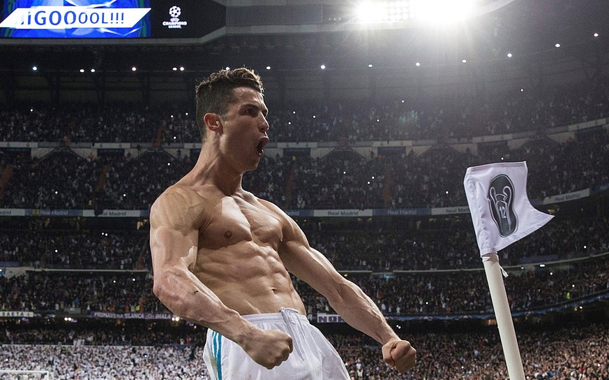 epa06662451 Real Madrid&#039;s Cristiano Ronaldo (R) celebrates next to Lucas Vazquez (L) after scoring the 1-3 during the UEFA Champions League quarter final, second leg soccer match between Real Mad ...