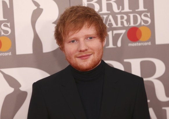 Ed Sheeran arrives for the Brit Awards at the O2 Arena in London, Britain, February 22, 2017. REUTERS/Neil Hall EDITORIAL USE ONLY. FOR EDITORIAL USE ONLY. NOT FOR SALE FOR MARKETING OR ADVERTISING CA ...