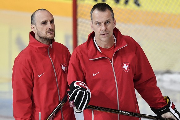 Switzerland’s assistant coach Christian Wohlwend, left, and Tommy Albelin, right, look on during a training session during the Ice Hockey World Championship in Paris, France on Wednesday, May 17, 2017 ...
