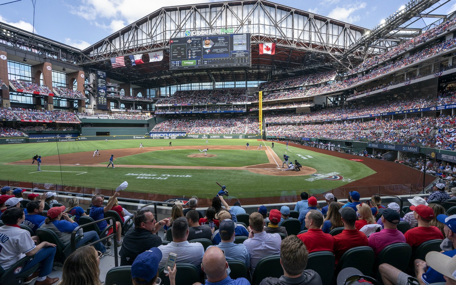 Fans fill the stands at Globe Life Field during the first inning of a baseball game between the Texas Rangers and the Toronto Blue Jays, Monday, April 5, 2021, in Arlington, Texas. The Rangers are set ...