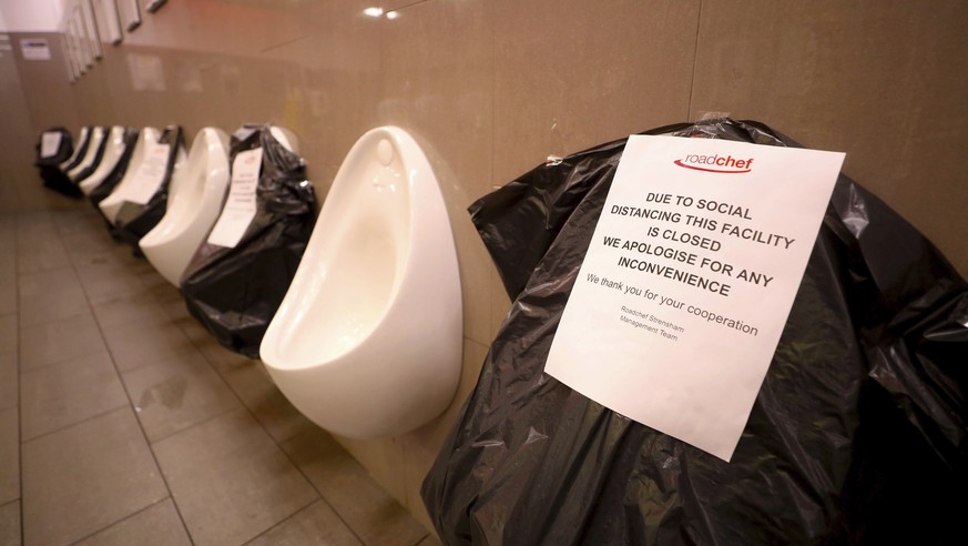 The men&#039;s toilet facilities at the Strensham Services on the M5 Motorway in Worcestershire, England, where alternate urinals are out of use to maintain social distancing as the UK continues in lo ...