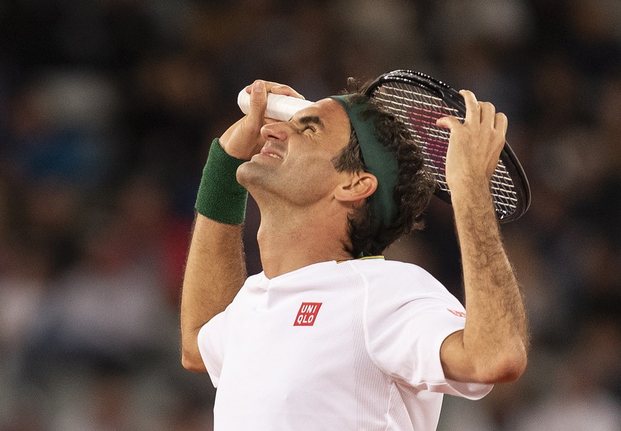 epa08201043 Roger Federer of Switzerland reacts whilst playing Rafael Nadal from Spain (not pictured) during the Match in Africa Cape Town charity event, Cape Town, South Africa 07 February 2020. Pres ...