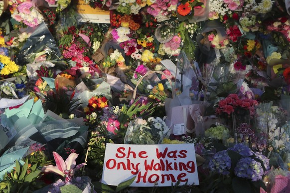 Floral tributes are placed at the bandstand in Clapham Common on Sunday, March 14, 2021, in memory of Sarah Everard who abducted and murdered after last being seen walking home from a friend&#039;s ap ...