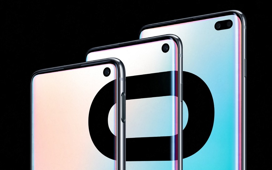 epa07384287 A handout photo made available by Samsung Electronics Co. shows a trio of its new Galaxy S10 smartphones unveiled during an Unpacked event in San Francisco, California, USA, 20 February 20 ...