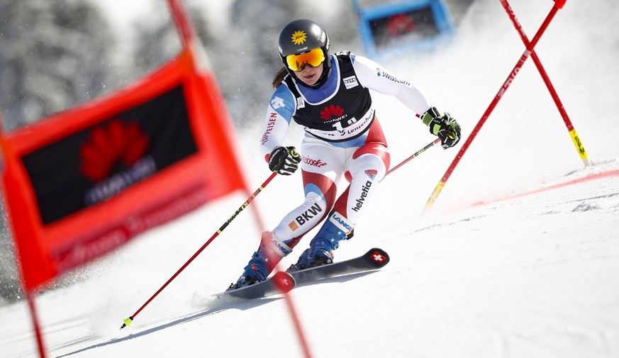 Switzerland&#039;s Jasmina Suter speeds down the course during an alpine ski, mixed World Cup team parallel event, in Lenzerheide, Switzerland, Friday, March 19, 2021. (AP Photo/Gabriele Facciotti)