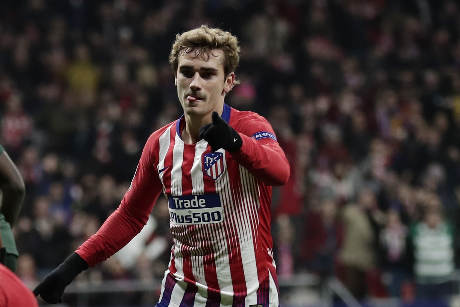 FILE - In this Wednesday, Nov. 28, 2018 file photo, Atletico forward Antoine Griezmann after scoring his side&#039;s second goal during a Group A Champions League soccer match between Atletico Madrid  ...