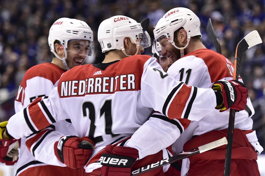 Carolina Hurricanes center Jordan Staal (11) celebrates his goal against Toronto Maple Leafs goaltender Garret Sparks with teammates during the third period of an NHL hockey game, Tuesday, April 2, 20 ...