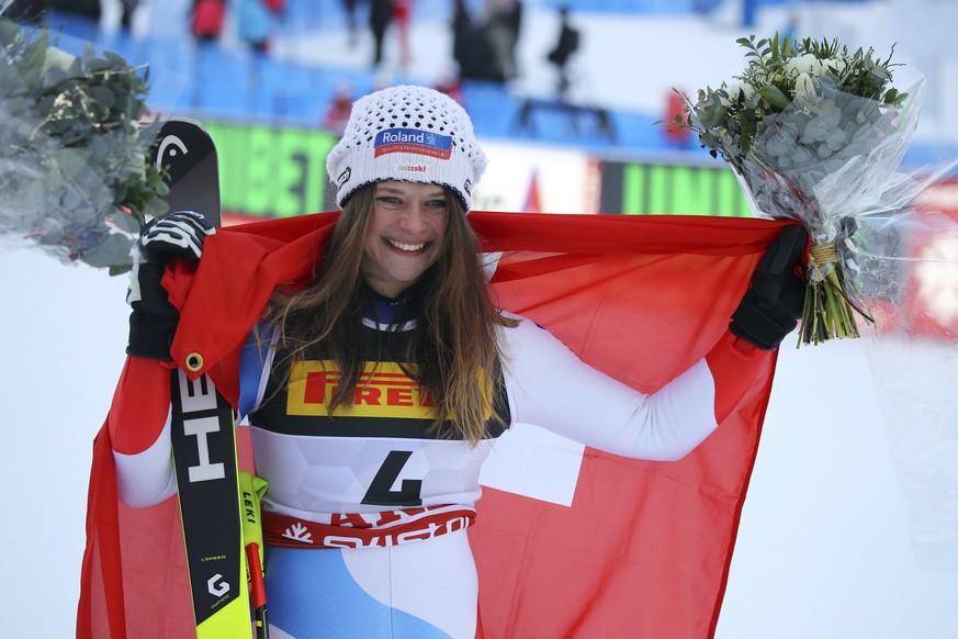 Switzerland&#039;s Corinne Suter celebrates taking third place in the women&#039;s super G during the alpine ski World Championships, in Are, Sweden, Tuesday, Feb. 5, 2019. (AP Photo/Marco Trovati)