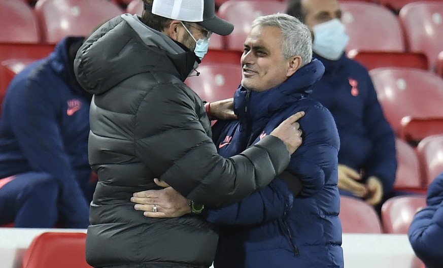 Liverpool&#039;s manager Jurgen Klopp, left greet Tottenham&#039;s manager Jose Mourinho on the side lines prior to kick off of the English Premier League soccer match between Liverpool and Tottenham  ...