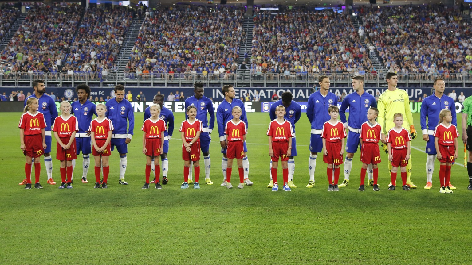 IMAGE DISTRIBUTED FOR INTERNATIONAL CHAMPIONS CUP - AC Milan and Chelsea FC players are escorted onto the pitch by McDonald&#039;s Kids ahead of their International Champions Cup soccer match on Wedne ...