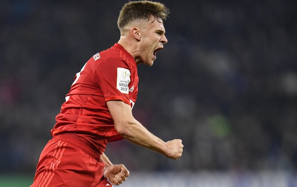 Bayern&#039;s Joshua Kimmich celebrates after scoring the opening goal during the German soccer cup, DFB Pokal, quarter-final match between FC Schalke 04 and Bayern Munich in Gelsenkirchen, Germany, T ...