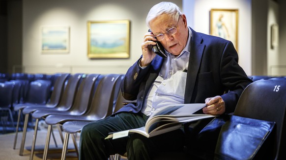 Former Swiss Federal councilor Christoph Blocher makes a phone call prior to a media visit of the exhibition of his collection entitled &quot;Chefs-d??uvre suisses&quot; (Swiss masterpieces in French) ...