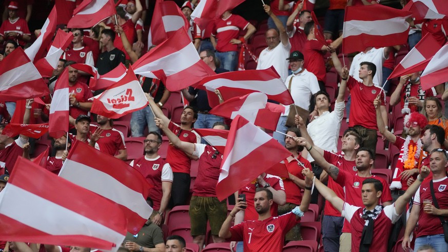 Austria fans enjoy prior to the start of the Euro 2020 soccer championship group C match between the The Netherlands and Austria at Johan Cruijff ArenA in Amsterdam, Netherlands, Thursday, June 17, 20 ...