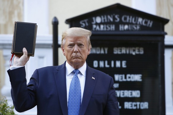 FILE - In this Monday, June 1, 2020 file photo, President Donald Trump holds a Bible as he visits outside St. John&#039;s Church across Lafayette Park from the White House. Only a few legacy-defining  ...