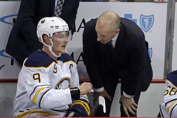Buffalo Sabres&#039; Jack Eichel (9) talks with coach Ralph Krueger during the first period of the team&#039;s NHL hockey game against the Pittsburgh Penguins in Pittsburgh, Thursday, Oct. 3, 2019. Th ...
