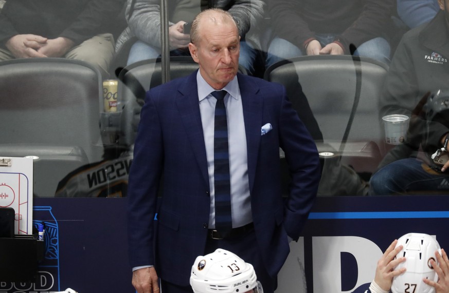Buffalo Sabres head coach Ralph Krueger looks on in the first period of an NHL hockey game against the Colorado Avalanche Wednesday, Feb. 26, 2020, in Denver. (AP Photo/David Zalubowski)
r m