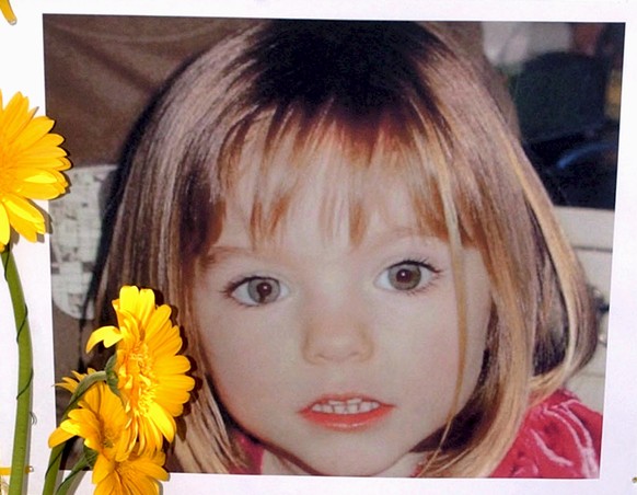 epa07546203 (FILE) - A file photograph dated 12 May 2007, reissued 04 May 2019 shows a poster displayed of three-year-old Madeleine McCann, a British girl who went missing in 2007 while on holiday wit ...