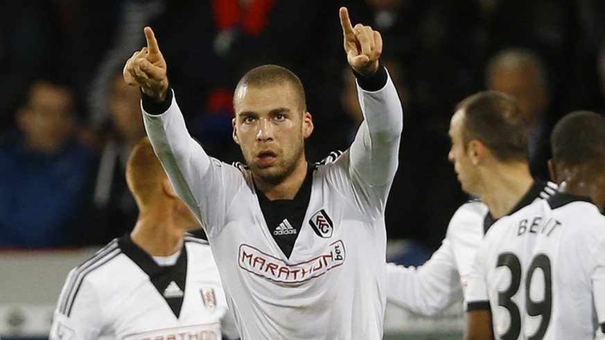 Fulham&#039;s Pajtim Kasami, center, celebrates scoring a goal during the English Premier League soccer match between Crystal Palace and Fulham at Selhurst Park Stadium in London, Monday, Oct. 21, 201 ...