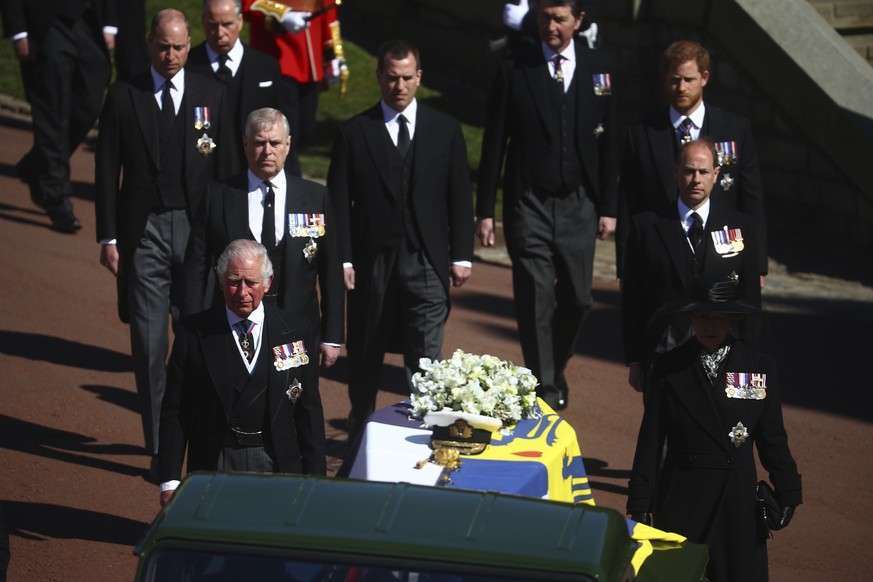 Members of the Royal family follow the coffin of Britain&#039;s Prince Philip during his funeral inside Windsor Castle in Windsor, England, Saturday, April 17, 2021. Prince Philip died April 9 at the  ...
