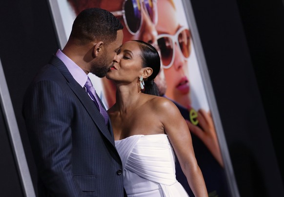 Will Smith, left, and Jada Pinkett Smith arrive at the world premiere of &quot;Focus&quot; at the TCL Chinese Theatre on Tuesday, Feb. 24, 2015, in Los Angeles. (Photo by John Salangsang/Invision/AP)