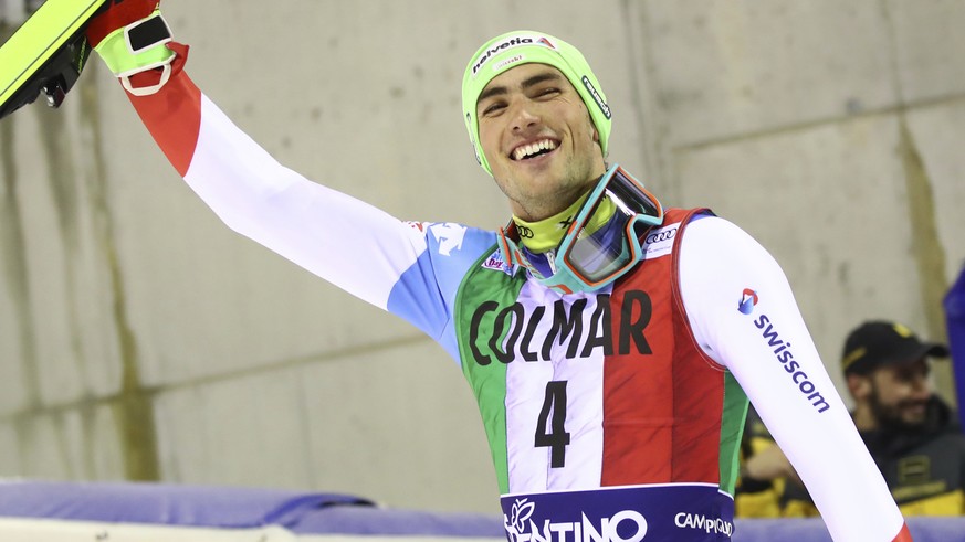 First placed Switzerland&#039;s Daniel Yule celebrates at the end of a ski World Cup Men&#039;s Slalom, in Madonna Di Campiglio, Italy, Saturday, Dec. 22, 2018. (AP Photo/Alessandro Trovati)