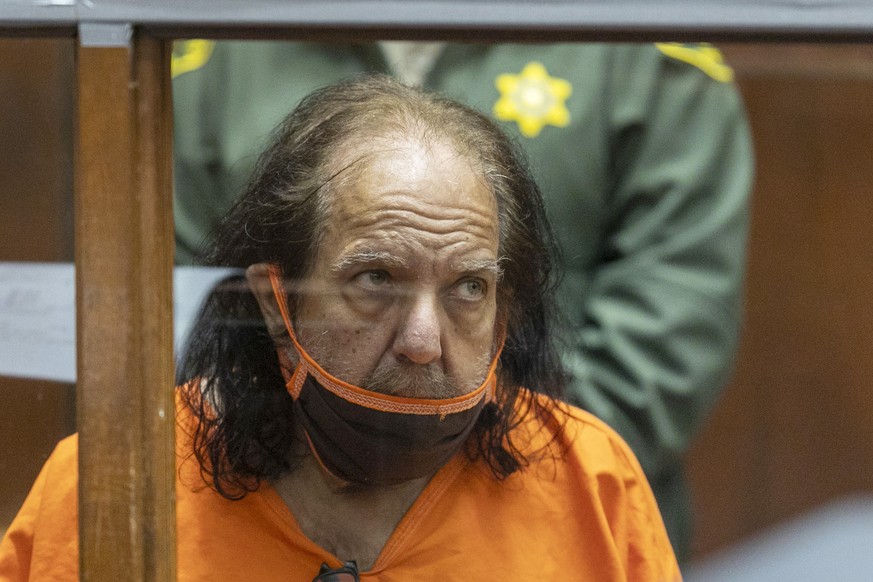 FILE - Adult film star Ron Jeremy appears for his arraignment on rape and sexual assault charges at Clara Shortridge Foltz Criminal Justice Center, on June 26, 2020, in Los Angeles. Jeremy has been ch ...